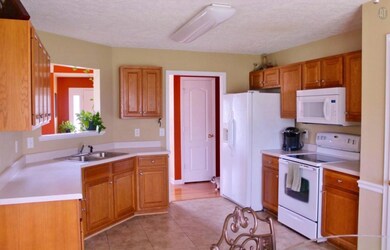 Pass through to great room and plentiful space in the kitchen.