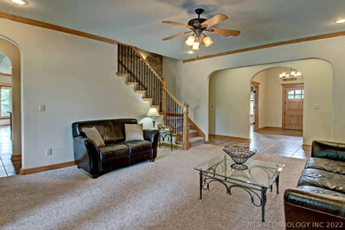 View of formal living towards entry. Archway to le