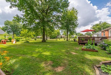 VIEW OF BACKYARD...