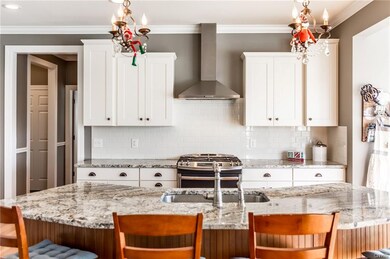 Custom kitchen design with varied cabinetry height