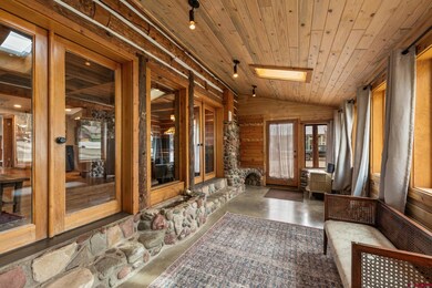 While fully heated, the mud room can be closed off from the rest of the house. There is also a drain by the door and concrete floors. Never have a muddy dog run through your house again.