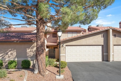 Mediterranean / spanish house with stucco siding and a tiled roof
