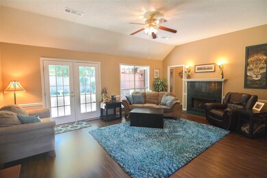 Incredible great room has vaulted ceiling and lots