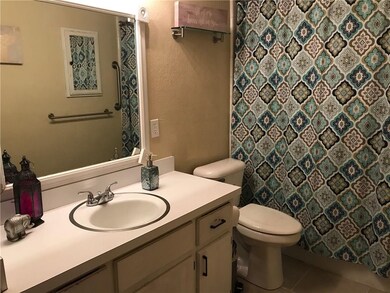 Bathroom with tub, shower combo and 17-toilet.  Ba