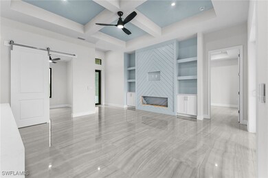 Unfurnished living room with a ceiling fan, basebo
