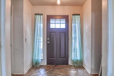 Entryway featuring a textured ceiling