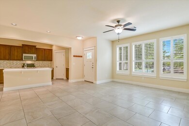 Kitchen featuring stainless steel microwave, ligh
