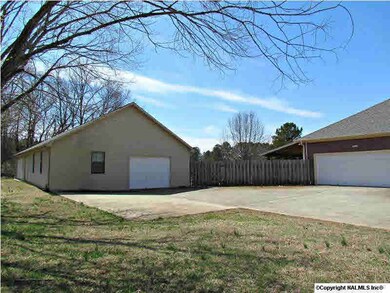 This home has a 2 car attached garage and a HUGE 61 x 30 detached garage and workshop