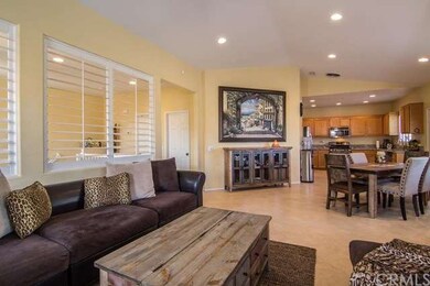 view of open family room and kitchen dining area!