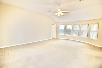 Wall of windows in the living room allows for lots of natural light!