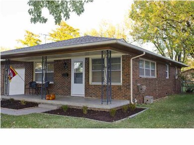 Super cute and cozy, covered front porch!