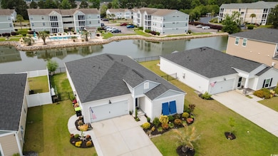 Aerial view featuring a residential view and a wat