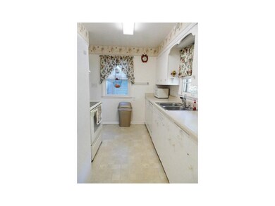 Kitchen. Galley style kitchen with all appliances 