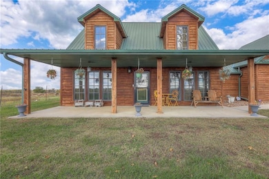 40 Acre Farm with a beautiful front porch