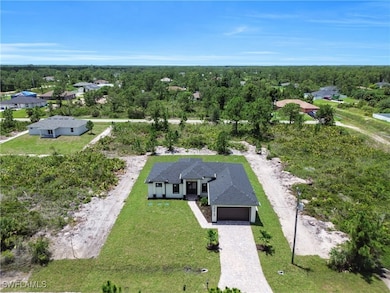 Aerial view of property and surrounding area