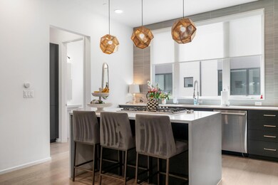 Kitchen with stainless steel appliances, modern c