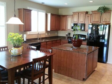Kitchen with staggered cabinets