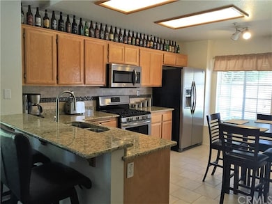 Remodeled kitchen with granite counter tops, tumbl