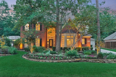 This charming two-story brick home features a beau