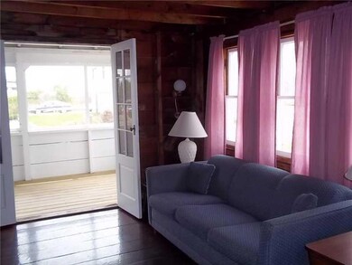 French doors in the living room open...