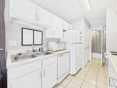 Galley Kitchen with Double Sink, DW & Refrigerator