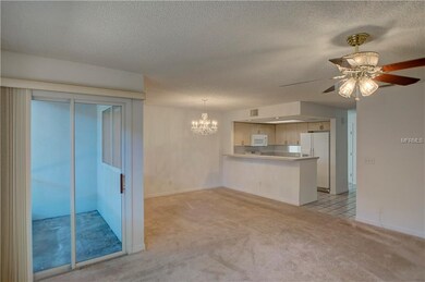 Living room looking at kitchen/dining