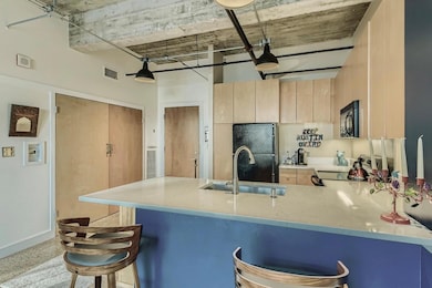 Well-appointed kitchen is furnished with housewares