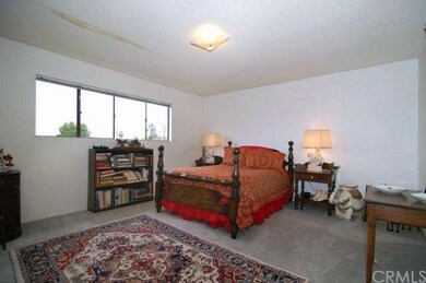Master bedroom with attached full bath and 2 close