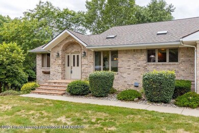 7139 Willow Woods Cir, Lansing, MI 48917 - photo 2