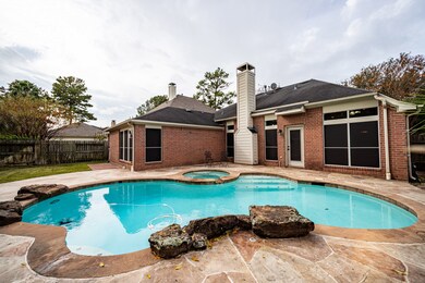 Another view of this beautiful refreshing pool. From this angle you can see the brick pavers for barbecue and the green space in the back yard.