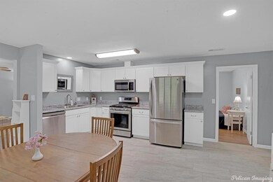 Large, open kitchen for family gatherings.  Attrac