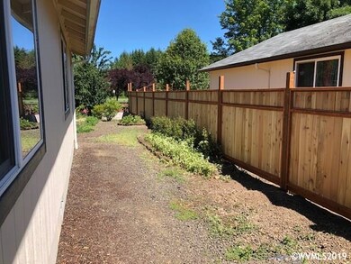 New Cedar Fence on south side