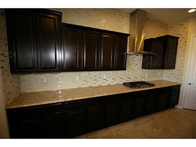 Kitchen. Mosaic tile back splash to ceiling!