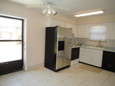 Storm door leading to open patio
