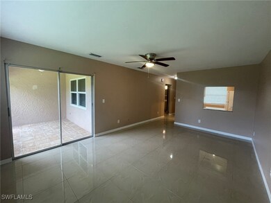 Empty room featuring ceiling fan