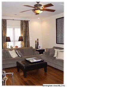 Gleaming hardwood floors, tall ceilings and crown 