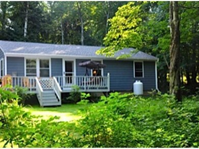 Exterior Front. Cheerful, sunny deck...