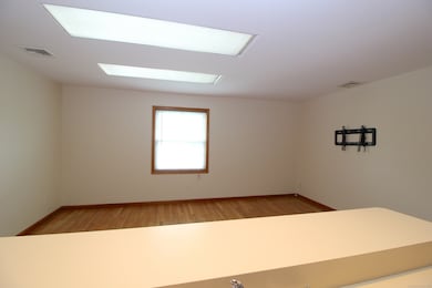 View from Kitchen. Skylights result on much natural light.