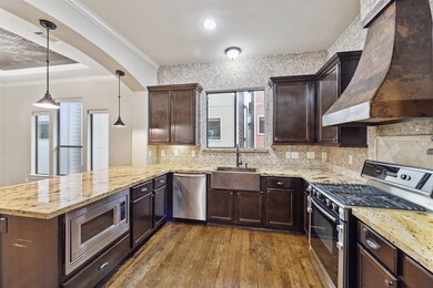Open floor plan seamlessly flows into kitchen, fea