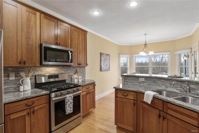 Updated kitchen with new granite and tile backspla