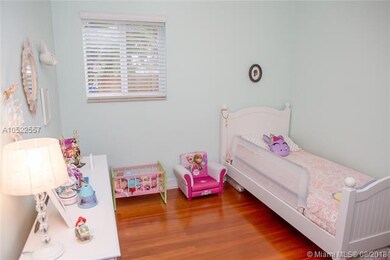 This is the 2nd bedroom. Also has beautiful wood l