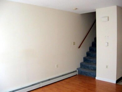 Living room to stairs to second floor