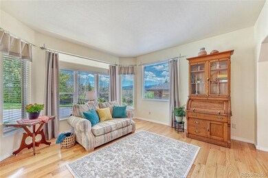 Gorgeous wood floors and open floorplan create a w