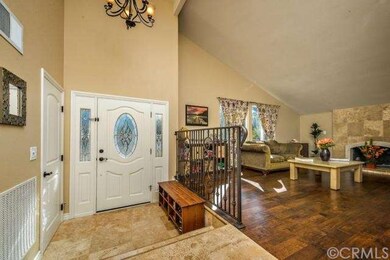 Travertine front entry and vaulted ceilings