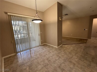 Unfurnished room featuring baseboards, visible ven