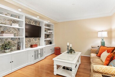 Comfortable living room with built in bookcases an