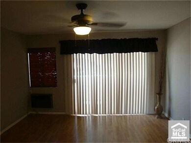 spacious living area w/ balcony
