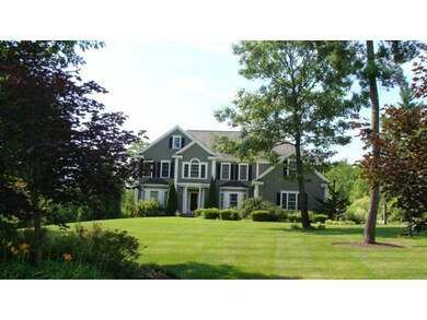 paved drive to 3-car garage