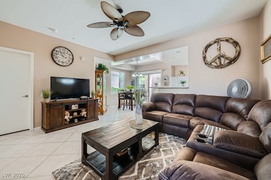 Living room with light tile floors on the diagonal