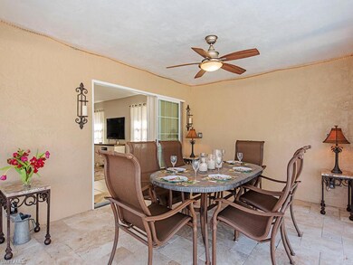 Al-fresco Dining Poolside with Travertine Lanai Fl